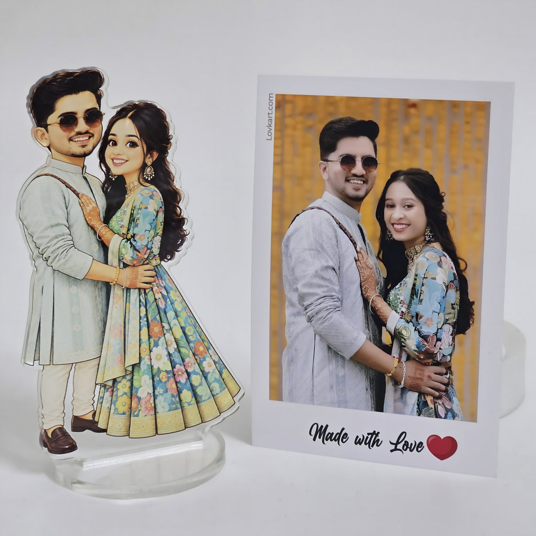 Chibi couple standee next to the original couple photo it was made from