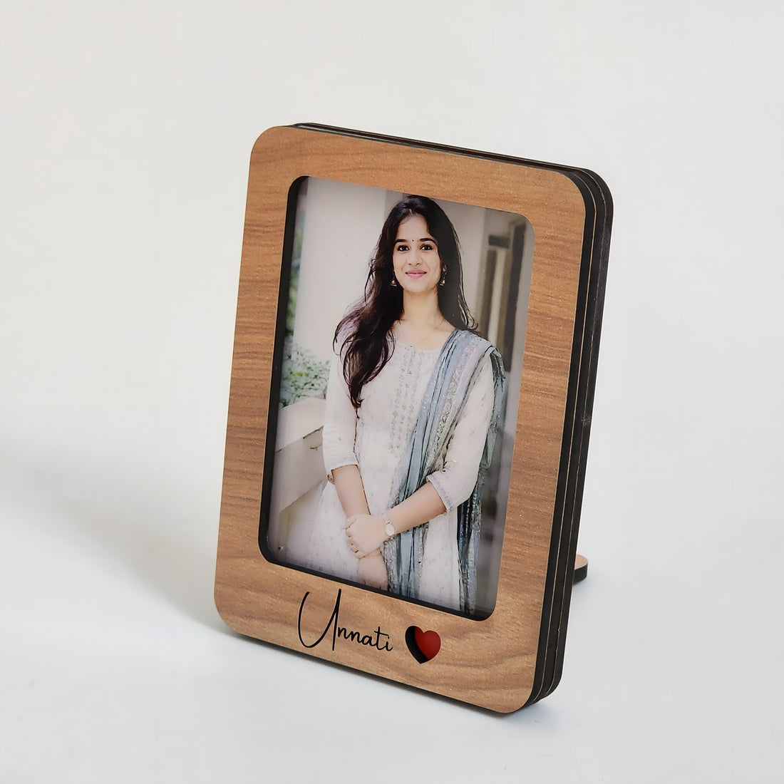 Personalised wooden photo frame with engraved name and red heart, front view